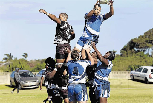 HIGH HOLDERS: Cape Peninsula University’s Clenton Peterson, with the ball, in action during their clash against Walter Sisulu University at Old Selbornians yesterdayPictures: SIB0NGILE NGALWA