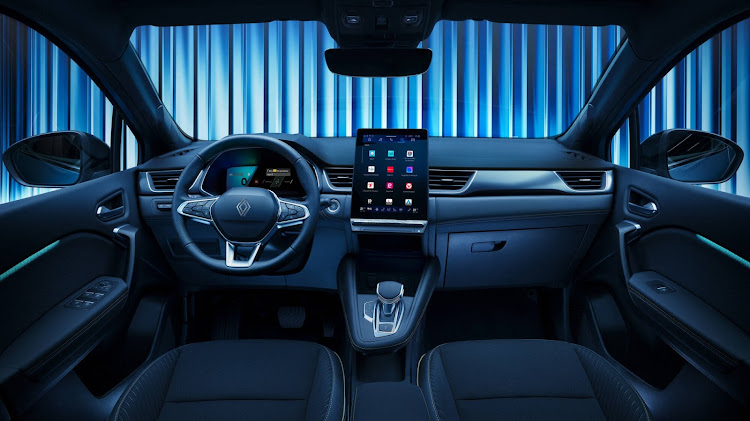 The interior has a floating main display screen and almost button-free layout.