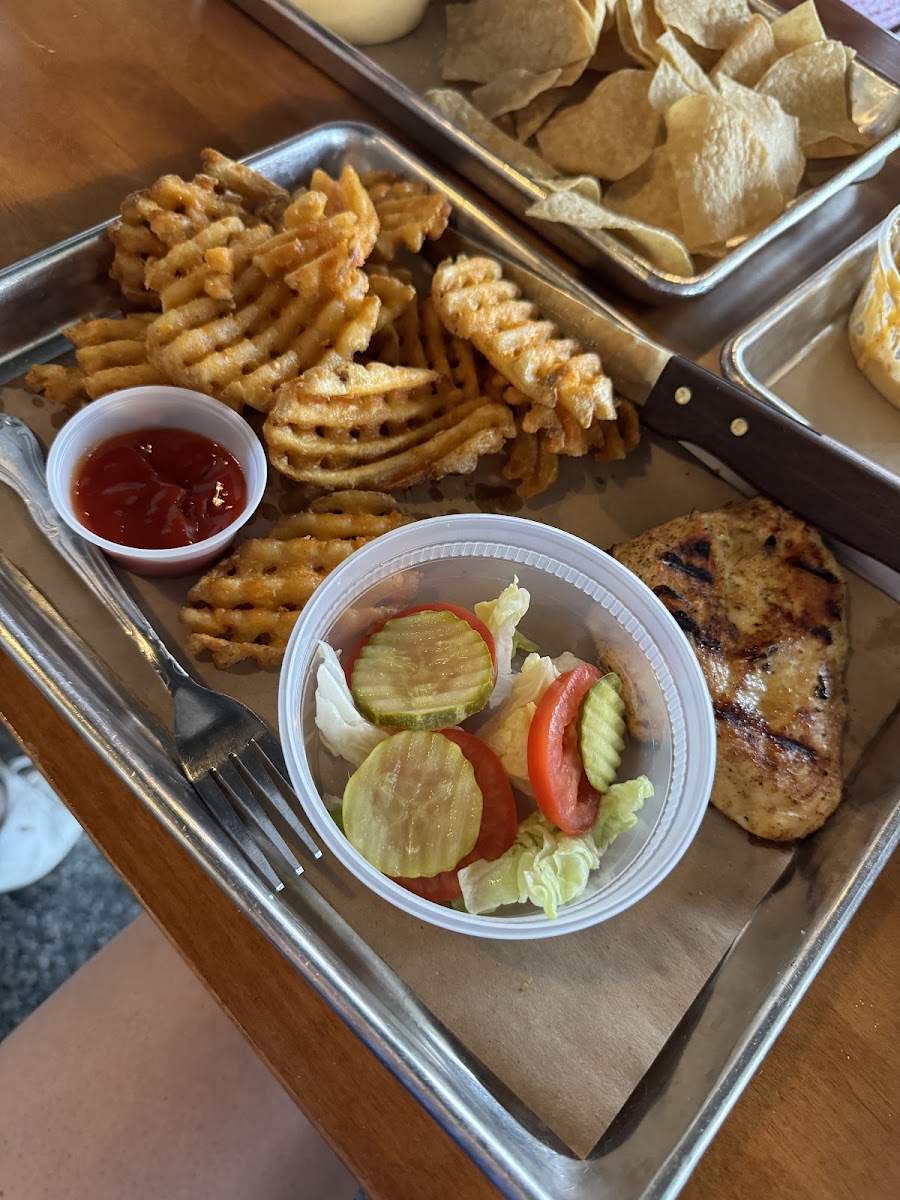 Grilled chicken sandwich (no bun) and seasoned GF waffle fries