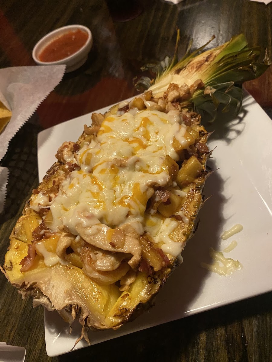 Grilled Pineapple w/ chicken, bacon, shrimp and cheese