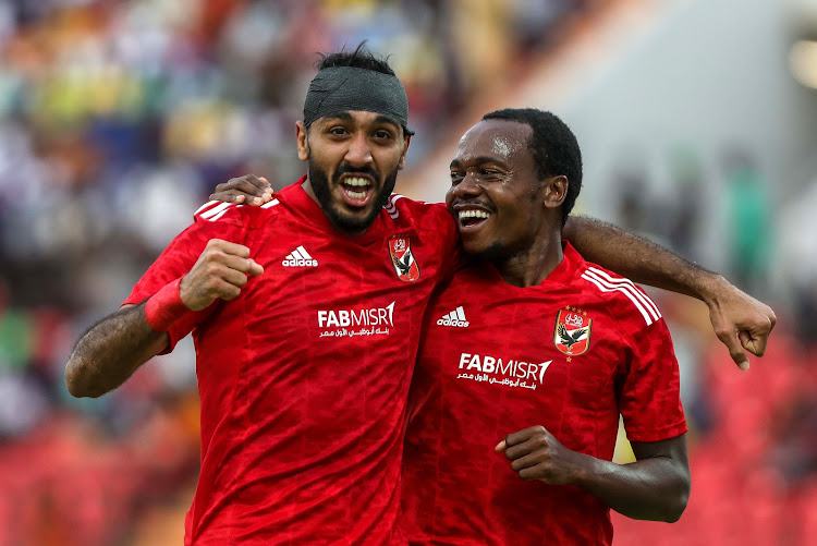 Mahmoud Kahraba of Al Ahly is congratulated by teammate Percy Tau during their CAF Champions League match against Coton Sport at Roumdé Adjia Stadium in Garoua, Cameroon on 17 March 2023.