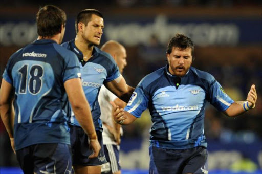 Pierre Spies and Derick Kuun during the Vodacom Super Rugby match between Vodacom Bulls and DHL Stormers at Loftus Versfeld on March 19, 2011 in Pretoria