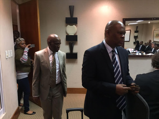 Former SABC COO Hlaudi Motsoeneng arrives with his lawyer Zola Majavu before the commencement of the disciplinary hearing.