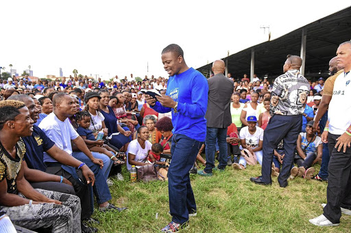 Shepherd Bushiri, seen here preaching, is out on bail after being charged with, among others, fraud.