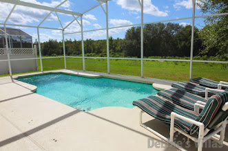 Private west-facing pool deck with woodland view on Highlands Reserve