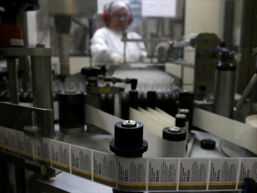 A woman works on the production of Yellow Fever vaccine at a laboratory in Oswaldo Cruz Foundation (Fiocruz) in Rio de Janeiro, Brazil, February 7, 2017. /REUTERS