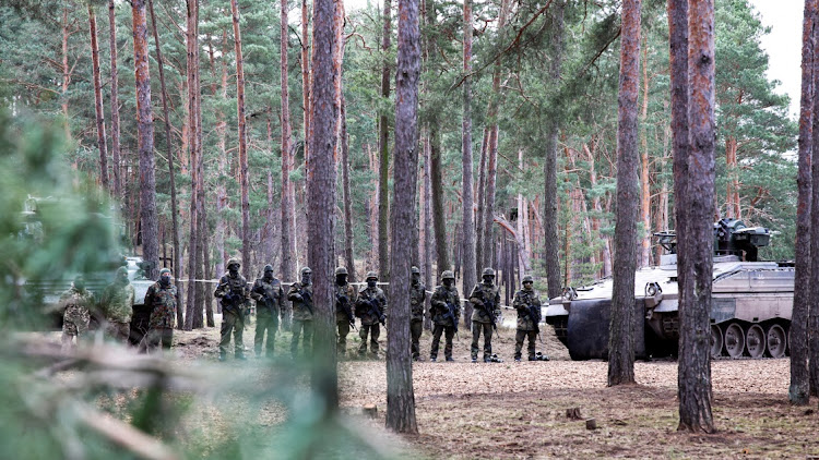 Ukrainian soldiers stand in line at a training site at an army base in Klietz, Germany, in this February 23 2024 file photo. Picture: LIESA JOHANNSSEN/REUTERS