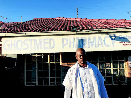 Moloko Mokoditoa stands in front of one of his closed pharmacies in Atteridgeville, Pretoria. / SUPPLIED