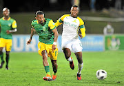 Lebohang Maboe of  Mamelodi Sundowns, right, is challenged by Wayde Jooste of Arrows in Wednesday's clash. 
