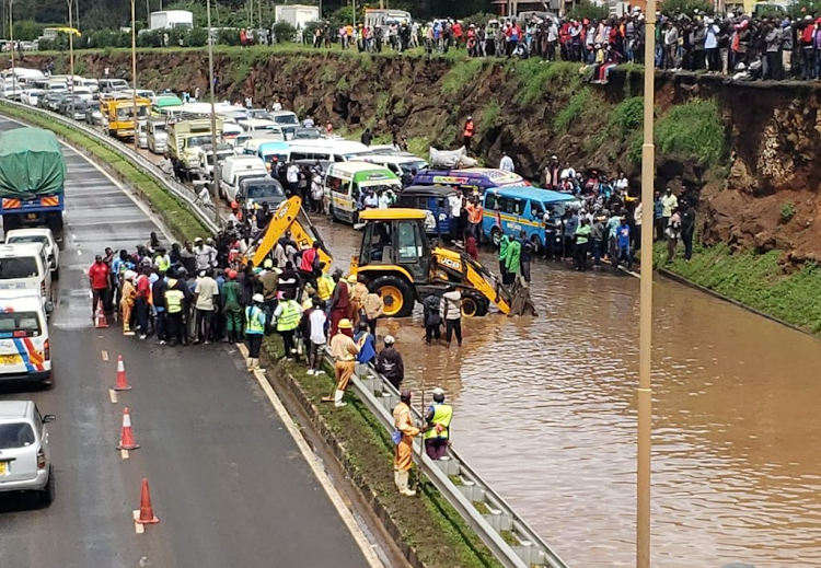 Kenha has resolved to open a guard rail with a backhoe as a temporary measure to ease flooding water and restore traffic to normalcy at the Juja underpass.