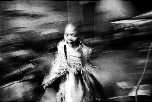 'Portrait of a Young Thwasa' (2008) is one of the photographs in 'Footprints' that emphasise everyday black life in South Africa.
