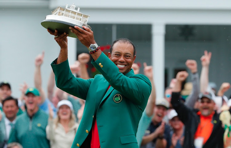 Tiger Woods takes the win (and green jacket) at the Augusta National.