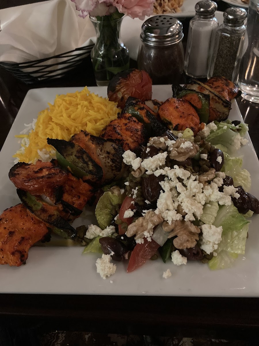 Chicien kabob with salad and rice