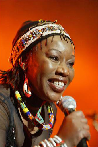 SOUNDS OF THE SEASON: Busi Mhlongo. Pic. Muntu Vilakazi. 03/09/2004. © Sunday Times. BUSINESS DAY WEEKEND REVIEW 7 oct 2006, pg 3 IGNORED: Busi Mhlongo was not included in this wishy-washy celebration of the country's sounds.