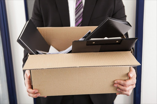 Office supplies in a brown cardboard box
