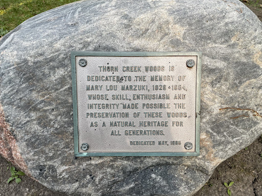 Thorn Creek Woods is dedicated to the memory of Mary Lou Marzuki, 1926-1984, whose skill, enthusiasm and integrity made possible the preservation of these woods as a natural heritage for all...