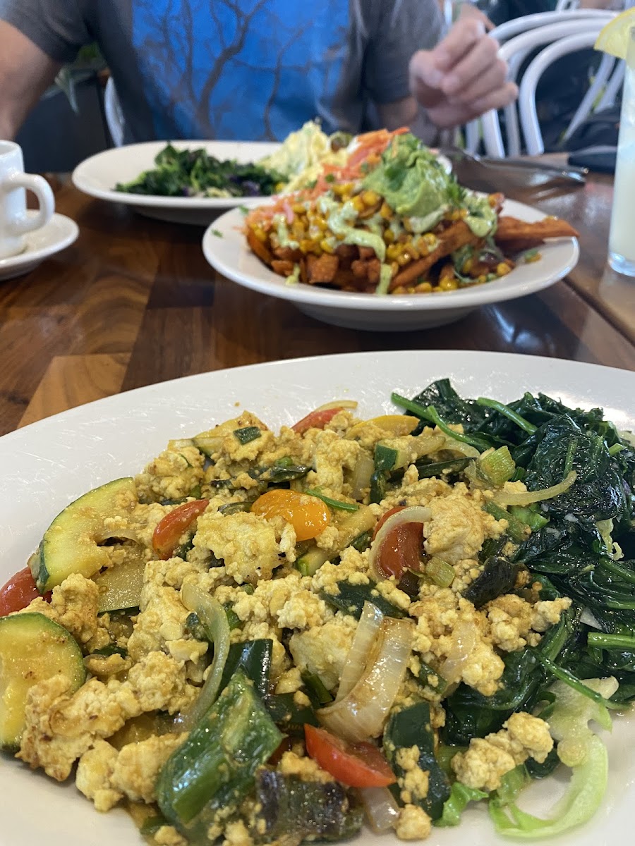 Tofu Summer Scramble- so good!!!  Zucchini, heirloom tomatoes, peppers and onions.  Served with greens or potatoes.