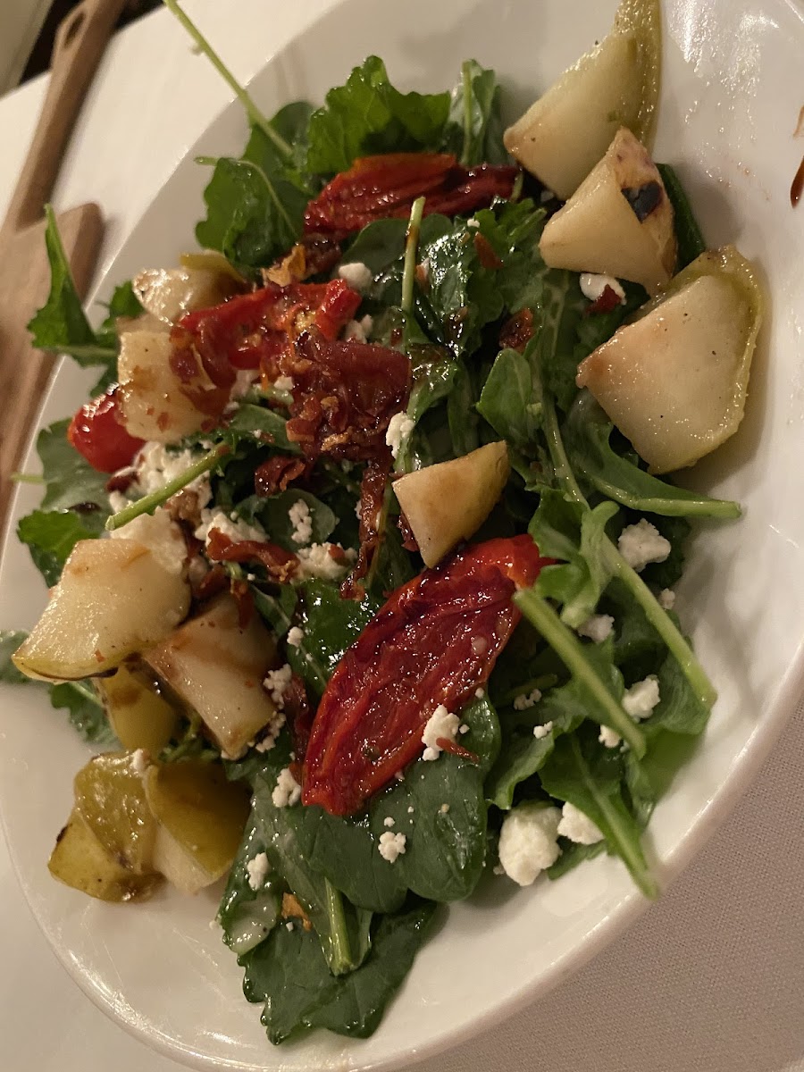 Grilled apple salad with roasted tomatoes and goat cheese