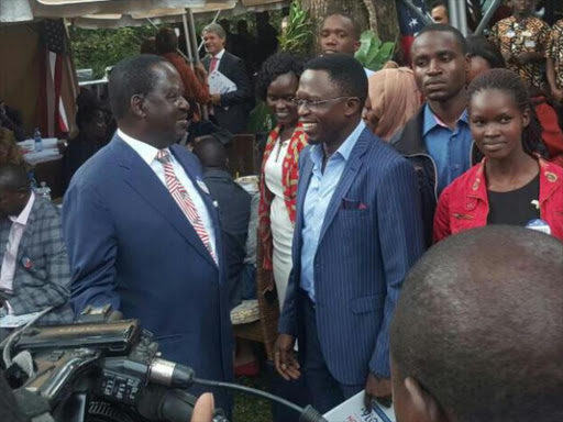 Cord leader Raila Odinga and Budalang'i MP Ababu Namwamba during the mock election at the US Embassy in Nairobi, November 9, 2016. /PATRICK VIDIJA