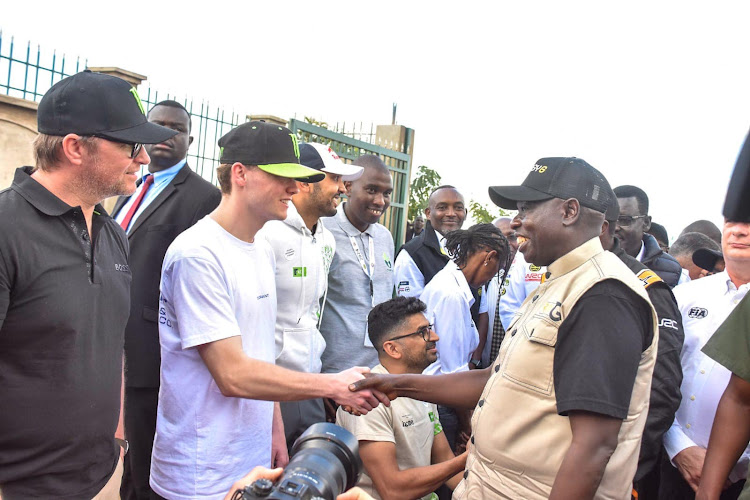 Deputy President Rigathi Gachagua shakes hands with Oliver Solberg with during the launch of Talanta Motorsport Academy in Kasarani.