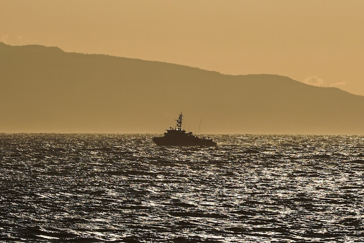 A Greek Coast Guard vessel sails, after a boat carrying migrants sank, off the island of Lesbos, Greece, October 6 2022. Picture: REUTERS/PANAGIOTIS BALASKAS
