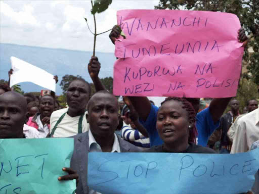 Hundreds of residents protested in Kabarnet town, Baringo County on Wednesday. The county Deputy Governor Engineer Mathew Tuitoek supported the residents to call for immediate transfer of top county security officers owing to failure to beef up security in the town.PHOTO/JOSEPH KANGOGO