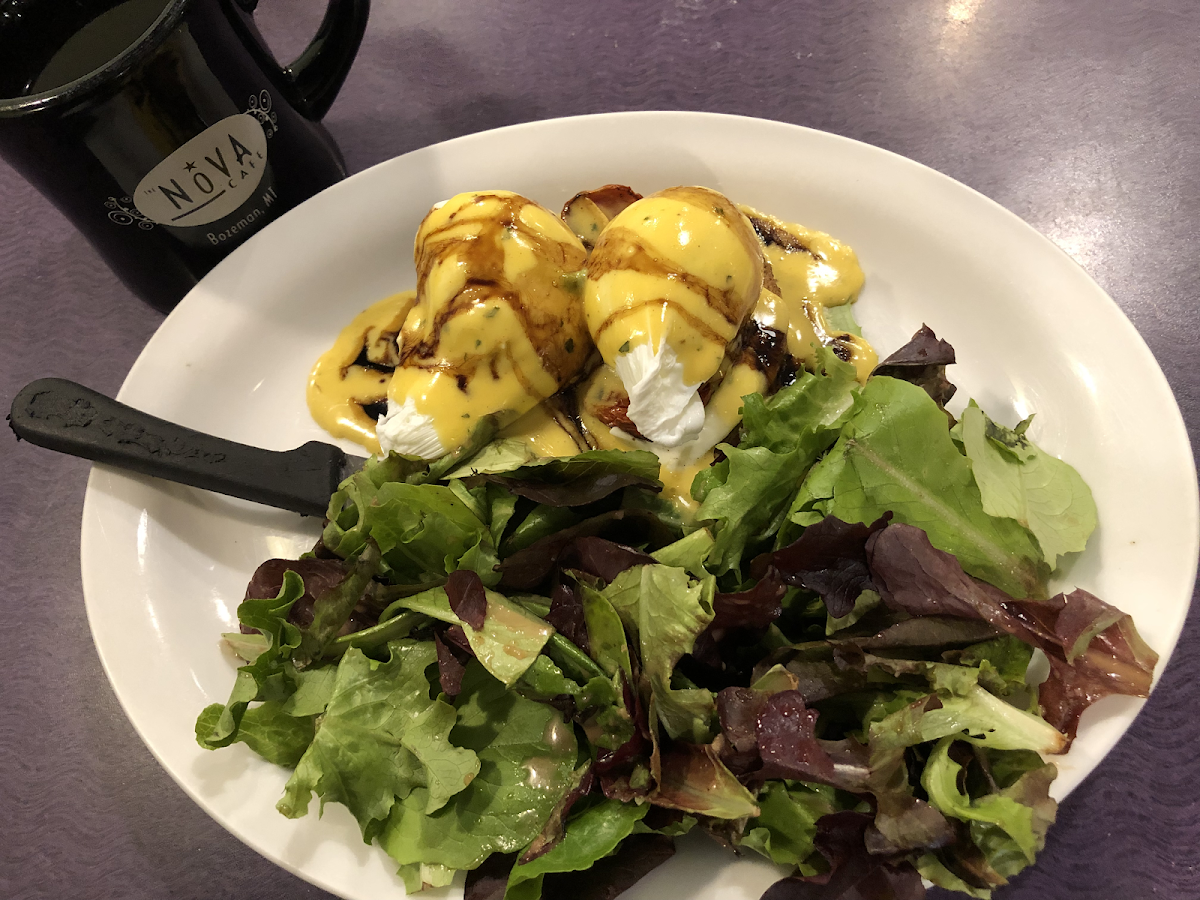 Special Caprese Benedict on gluten free toast with greens.