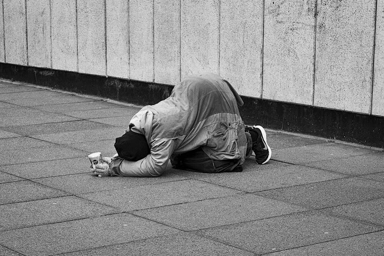 Beggar, London, 2022.