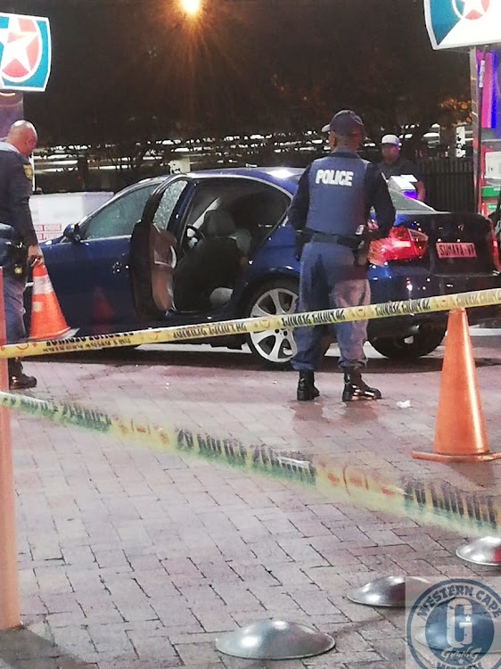 The driver of this blue BMW was shot dead at point blank range at a fuel station in Kenilworth, Cape Town, on Saturday night April 6, 2019