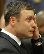 South African Paralympic athlete Oscar Pistorius reacts in the dock during the verdict in his murder trial, Pretoria, South Africa, 11 September 2014. EPA/KIM LUDBROOK/POOL