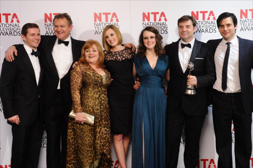 Winners of Drama Award (L-R) Allen Leech, Hugh Bonneville, Lesley Nicol, Laura Carmichael, Sophie McShera, Brendan Coyle, Rob James-Collier poses in the press room at the National Television Awards 2012 at the O2 Arena on January 25, 2012 in London, England. (January 24, 2012 - Source: Ian Gavan/Getty Images Europe)