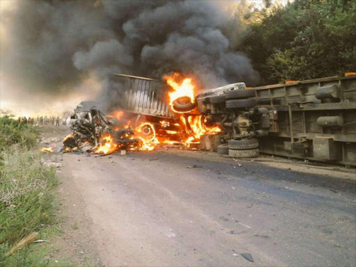 Fuel tanker bursts into flames along Mahi Mahiu yesterday after it crashed with eight vehicles. One person was burned to death, three suffered serious burn injuries. photo/COURTESY