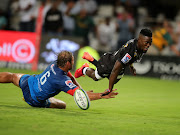 Sanele Nohamba, pictured here scoring a Super Rugby try for the Cell C Sharks against the Vodacom Bulls in Durban on January 31 2020, gets to start at scrumhalf for the Rebels.  