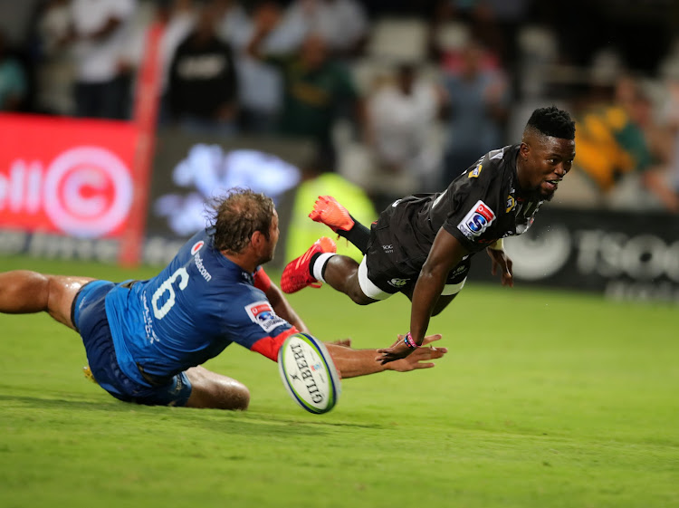 Sanele Nohamba, pictured here scoring a Super Rugby try for the Cell C Sharks against the Vodacom Bulls in Durban on January 31 2020, gets to start at scrumhalf for the Rebels.