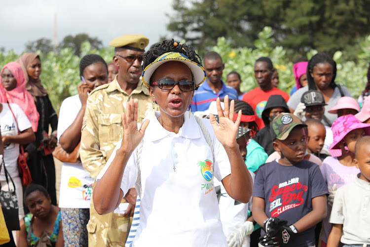 Progress Welfare Association of Malindi chairperson Kate Mwikali during the monthly clean-up excercise along the Casino beach in the resort town.