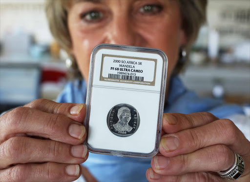 Avid collector Arlene Beneke with one of her other Mandela coins.