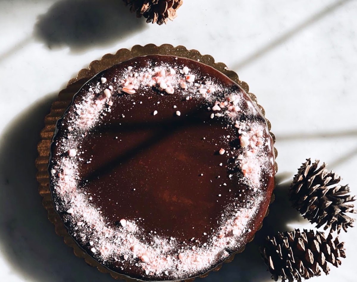 Gluten free chocolate flourless cake. Decorated with crushed peppermint for Christmas, YUM!