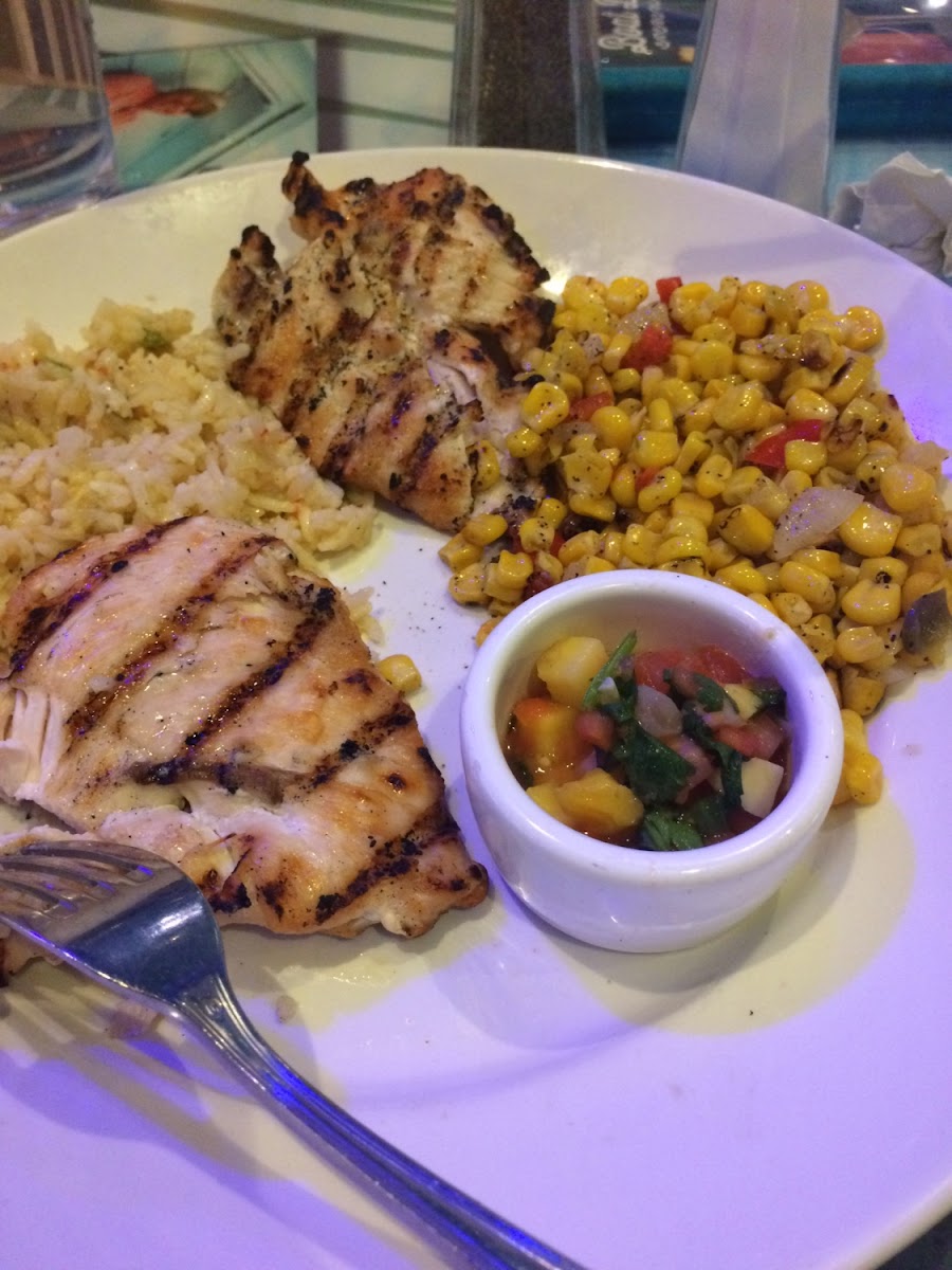 Grilled chicken with mango salsa, roasted corn and rice