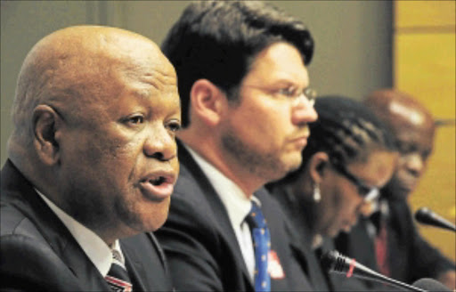 TOP BRASS: Justice Minister Jeff Radebe, Deputy Justice Minister Andries Nel, director-general Nonkululeko Sindani and head of policy Jacob Skosana at a media briefing in Cape Town yesterday on the transformation of the judicial system and the role of the courts in a developmental state. PHOTO: SIYABULELA DUDA