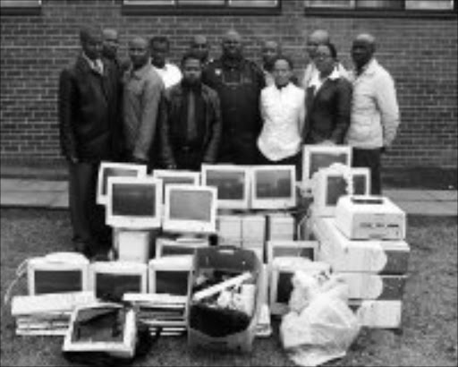 IMPRESSIVE HAUL: Police at Harding recovered 18 computers stolen from Mdalushi High School earlier this month. Four suspects, including a taxi driver, have been arrested in connection with the break-in at the school. © Sowetan.