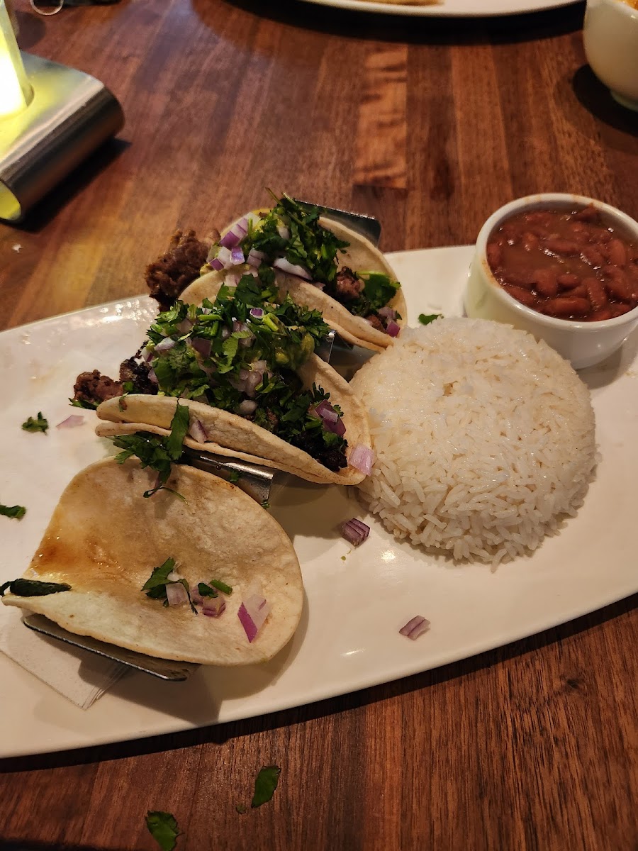 Soft corn tacos with jasmine rice and beans