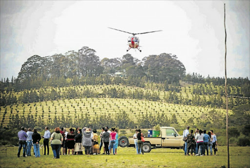 ALONG FOR THE RIDE: Helicopter rides were one of the many attractions at the Ncera Macadamia Harvest at the weekend. Picture: DYLAN WEARING