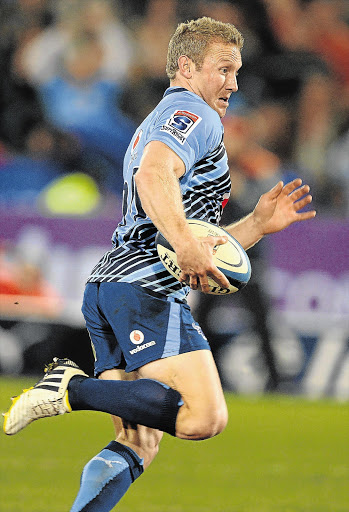 Jano Vermaak of the Bulls runs in for the winning try during the Super rugby match against the Sharks at Loftus on Saturday