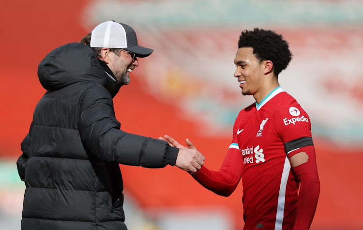 Alexander-Arnold with Liverpool manager Jurgen Klopp in a past match