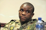 Lieutenant-general Nhlanhla Mkhwanazi at a press conference yesterday after his appointment this week as acting national police commissioner. His raised rank was not formally announced.