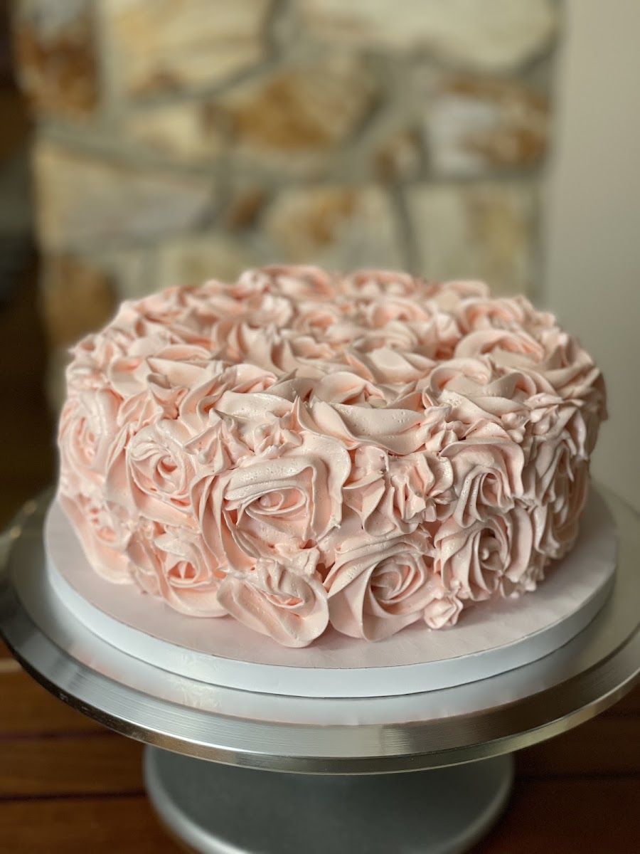 Gluten-free chocolate cake with gorgeous pink rosette buttercream