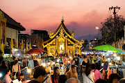 A bustling evening market in Chiang Mai, Thailand. 