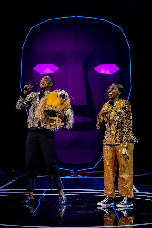 Mpho Popps and Khutso Theledi on the Masked Singer SA stage.