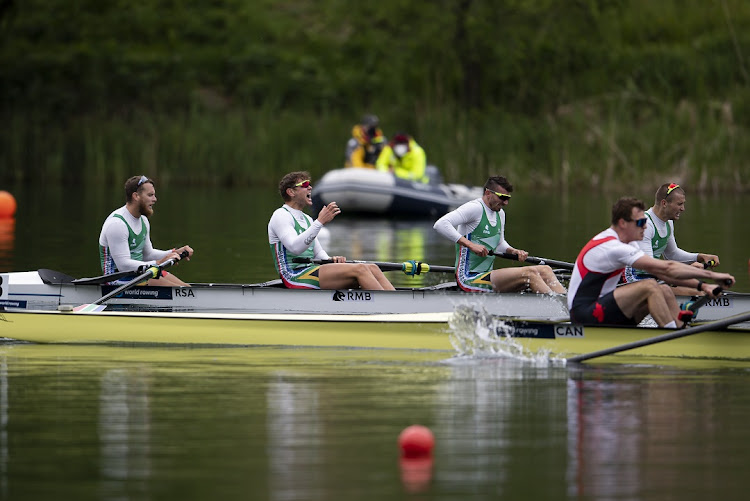 Lawrence Brittain, Kyle Schoonbee, John Smith and Sandro Paulo Torrente of South Africa react after the men's four final of the 2021 final Olympic qualification regatta in Lucerne, Switzerland on May 16, 2021.