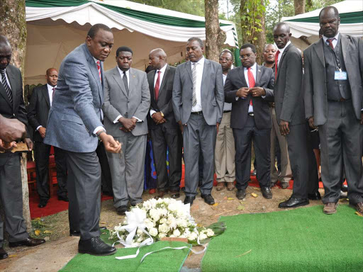 President Uhuru Kenyatta accompanied by other leaders from Western region to pay last respect for former Malava MP.Soita Shitanda in Butali Kakamega county on Saturday.PHOTO/SAMUEL SIMITI